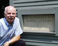 Ed Orser, professor of American studies, at the Cowdensville A.M.E. Church. One of Orser's popular Community Studies Projects focused on the historic Cowdensville community.