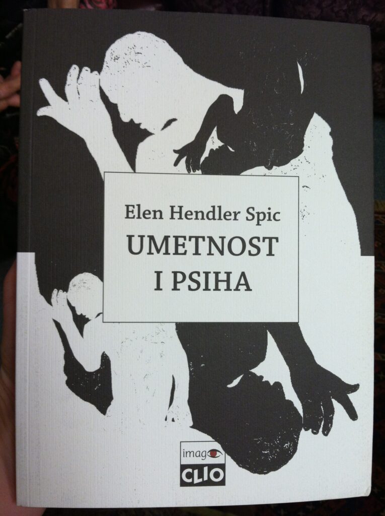 A book cover with black and white human silhouette imagery.