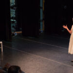 Jessie Gilson performs monologue on stage