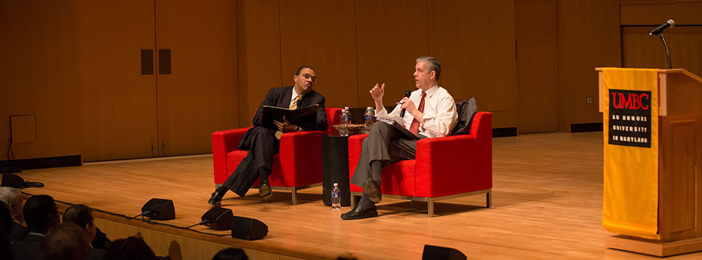 UMBC President Freeman Hrabowski and former U.S. Secretary of Education Arne Duncan, sitting on a stage speaking