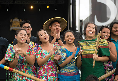 Student and alumni performers make a joyful noise all day long on the House of Grit Community Festival stage.