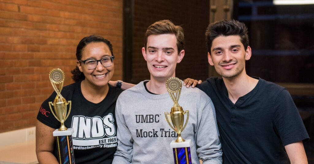 UMBC Mock Trial seniors (l-r) Kayla Smith, Dylan Elliott, and Zuhair Riaz.