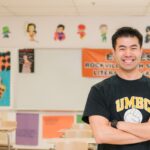 UMBC alumnus Sean Pang in his classroom