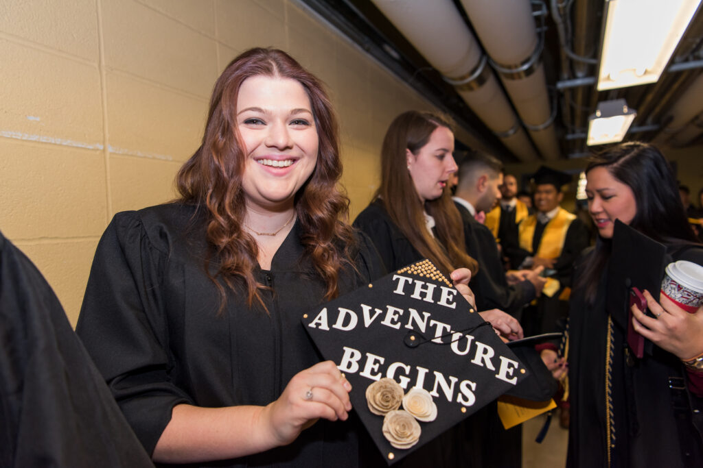 Students get creative with their caps during Winter Commencement. 