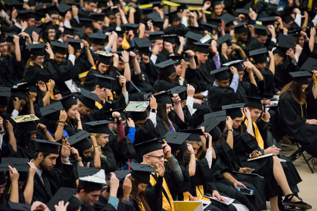 The undergraduate class of 2017 turns their tassels during Winter Commencement.