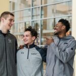 Graduating seniors from the UMBC basketball team (l to r): Joe Sherburne, KJ Maura, and Arkel Lamar.