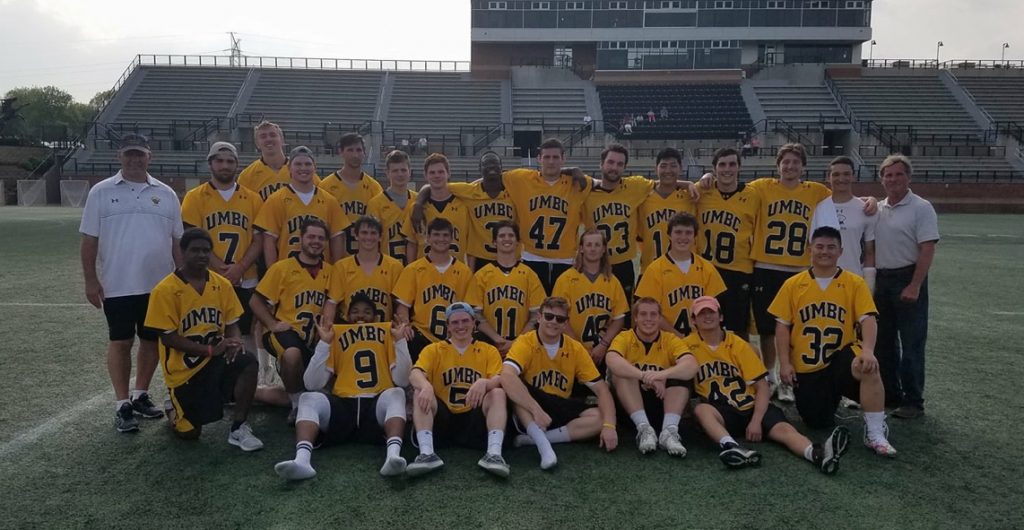 Group photo of UMBC lacrosse team and their coaches.