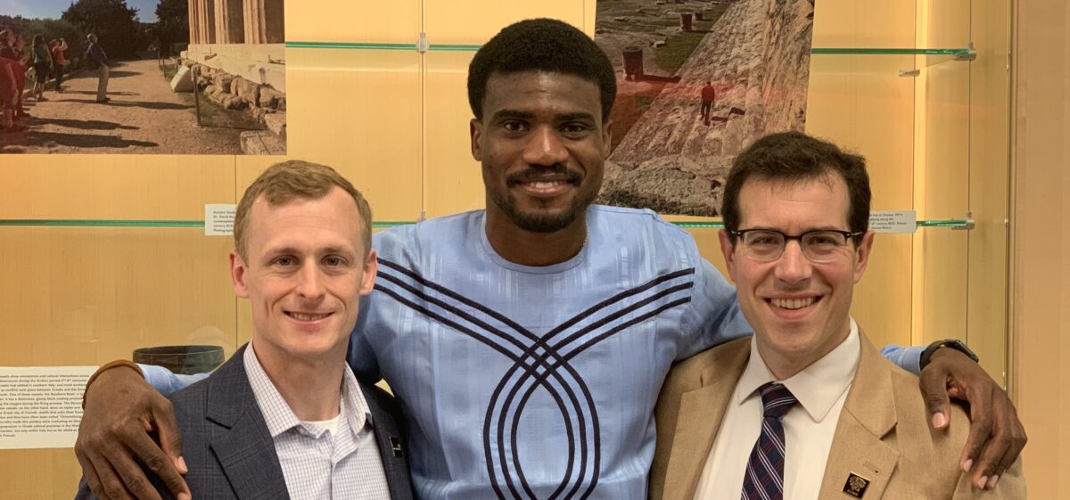 Damian Doyle, right, and Ray Soellner, left, the associate director of telecommunications, and Tobi Odunsi, middle, a master's student in cyber security. Photo courtesy of Tobi Odunsi.