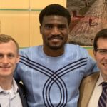 Damian Doyle, right, and Ray Soellner, left, the associate director of telecommunications, and Tobi Odunsi, middle, a master's student in cyber security. Photo courtesy of Tobi Odunsi.