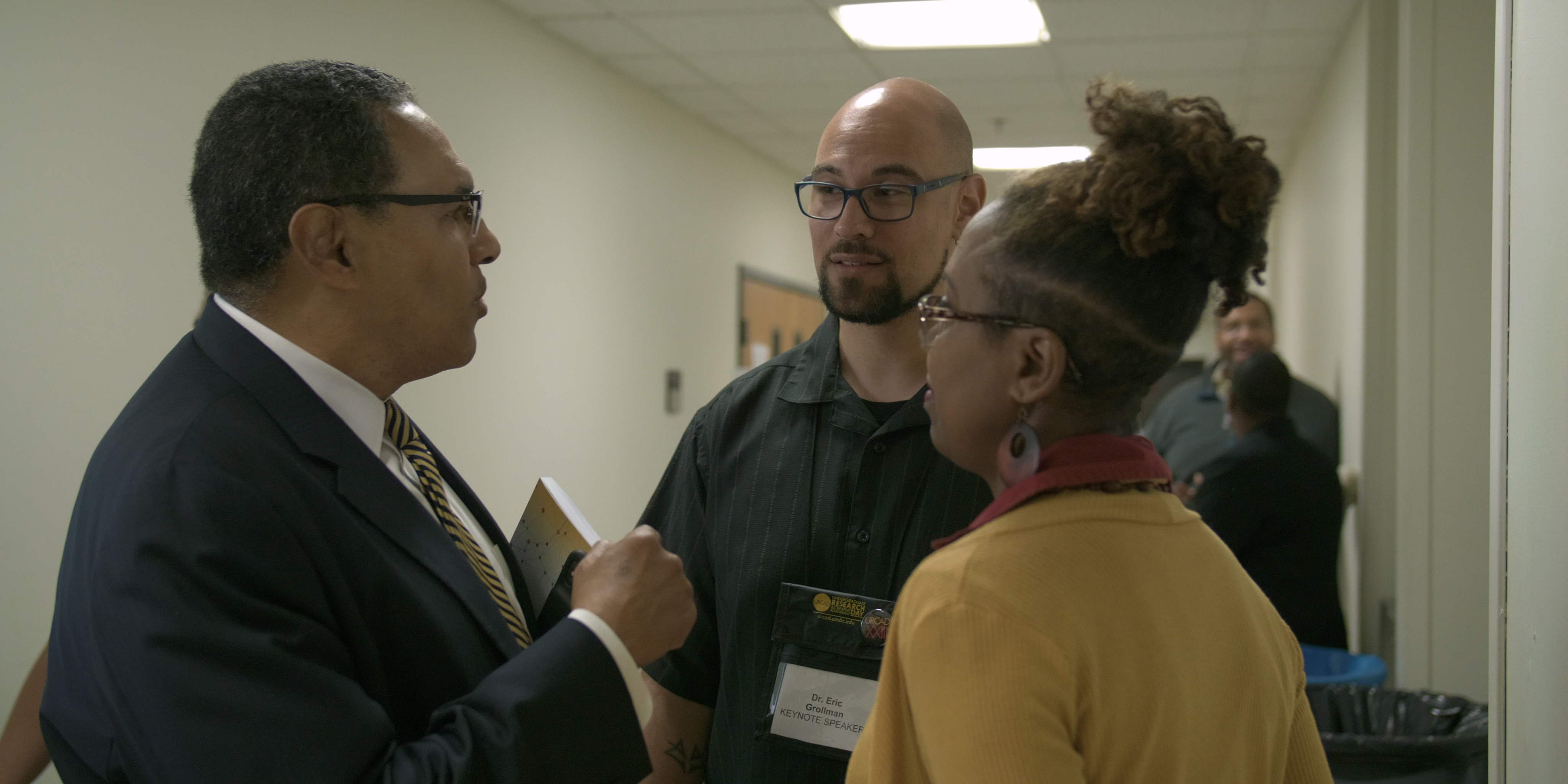 Dr. Hrabowski speaks with Keynote speaker Dr. Eric Grollman and Lisa Gray, UMBC's Associate Director of Diversity and Inclusion.