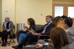 Paul Raphael '83 speaks to a group of international students. Photo courtesy of Raquel Hamner '20.