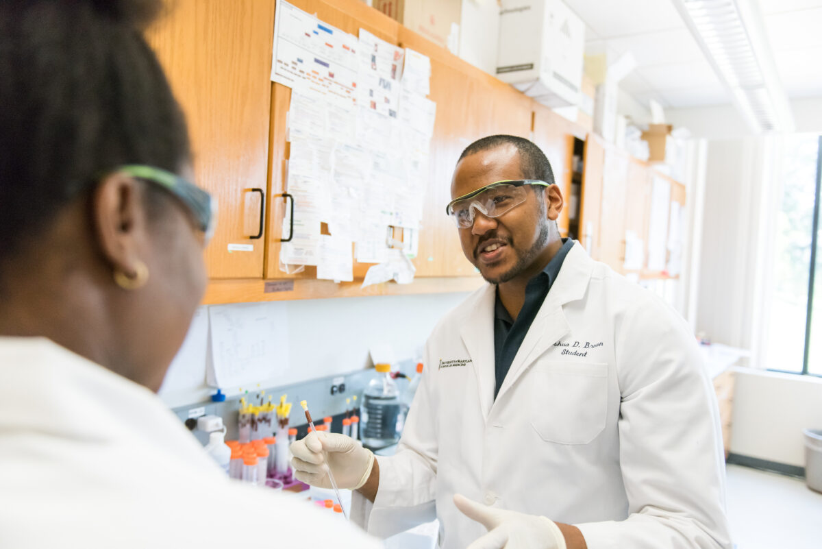 Alexis Waller ’18 and her mentor, Pengfei Ding, at work in the lab. Photo by Marlayna Demond ’11 for UMBC.