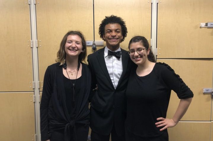 Hosten takes a break from performing to pose with fellow musicians (l to r) Anne Saba ‘19, mathematics, and Shabnam Parsa ‘19, biological sciences. Photo courtesy of Hosten.