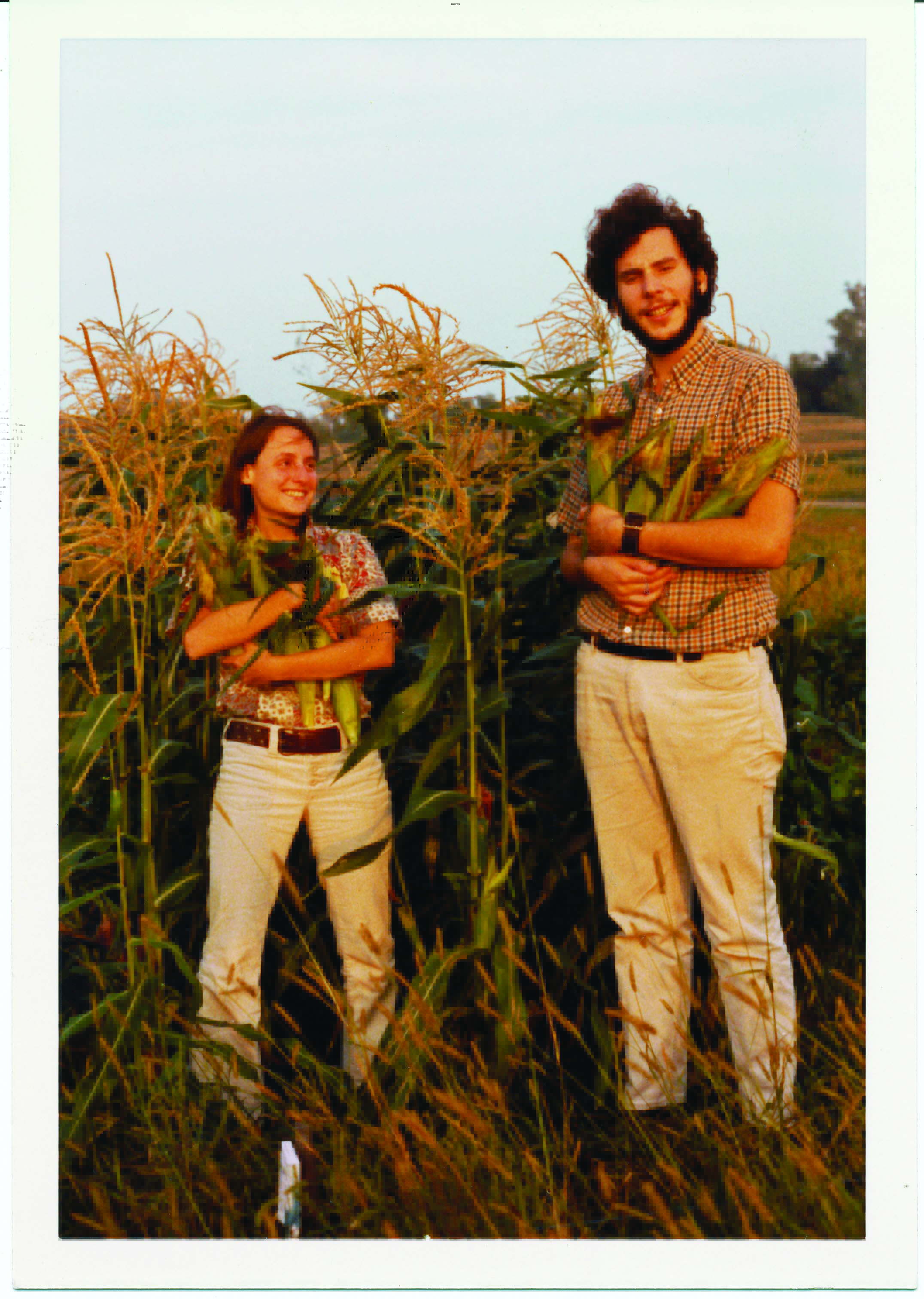 Warren and Amy Belasco harvest corn at their first community garden plot in Ann Arbor, MI, in the early 1970s.