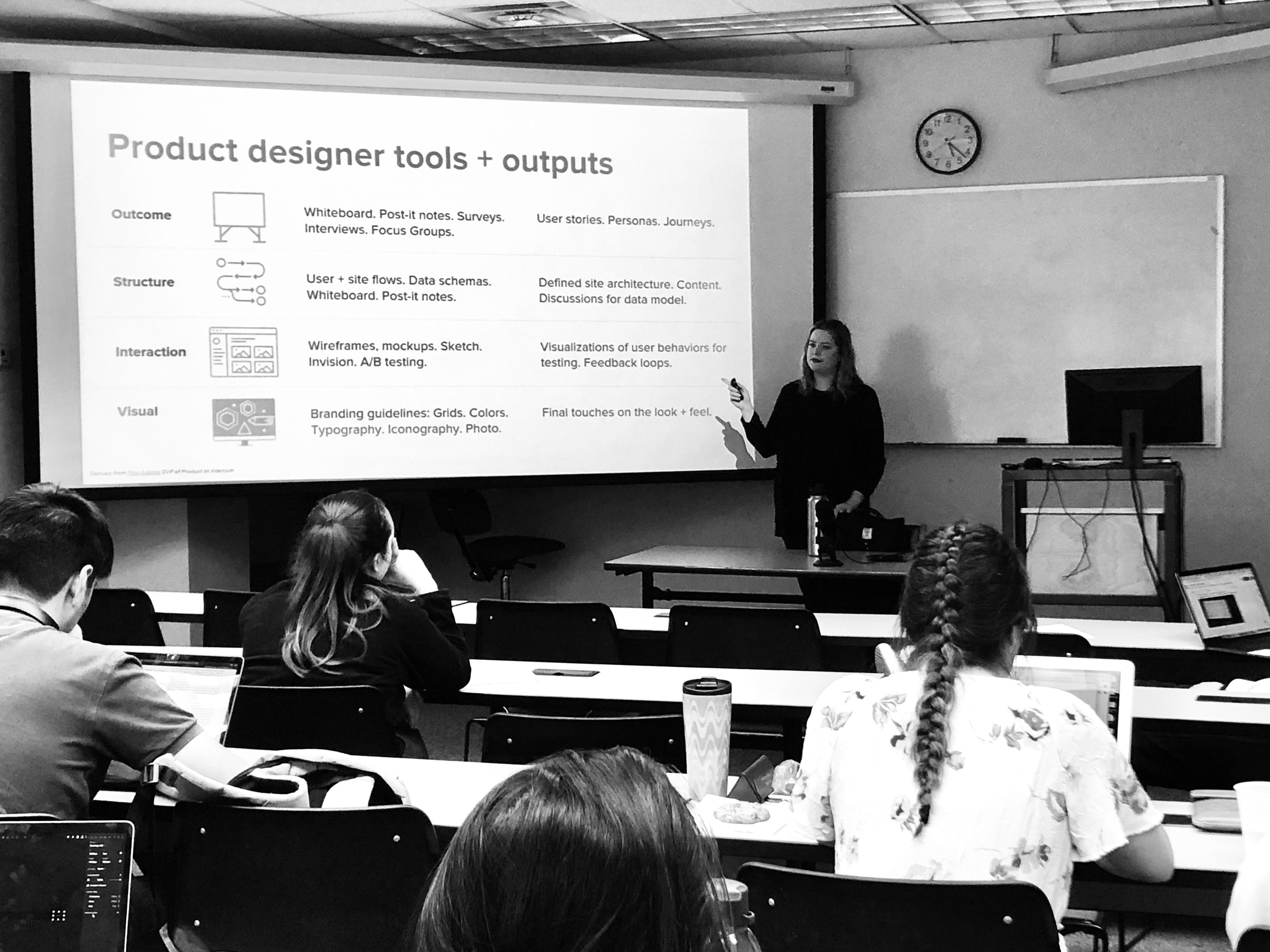 Kelsey Krach guest lecturing on human-centered design at a local university.