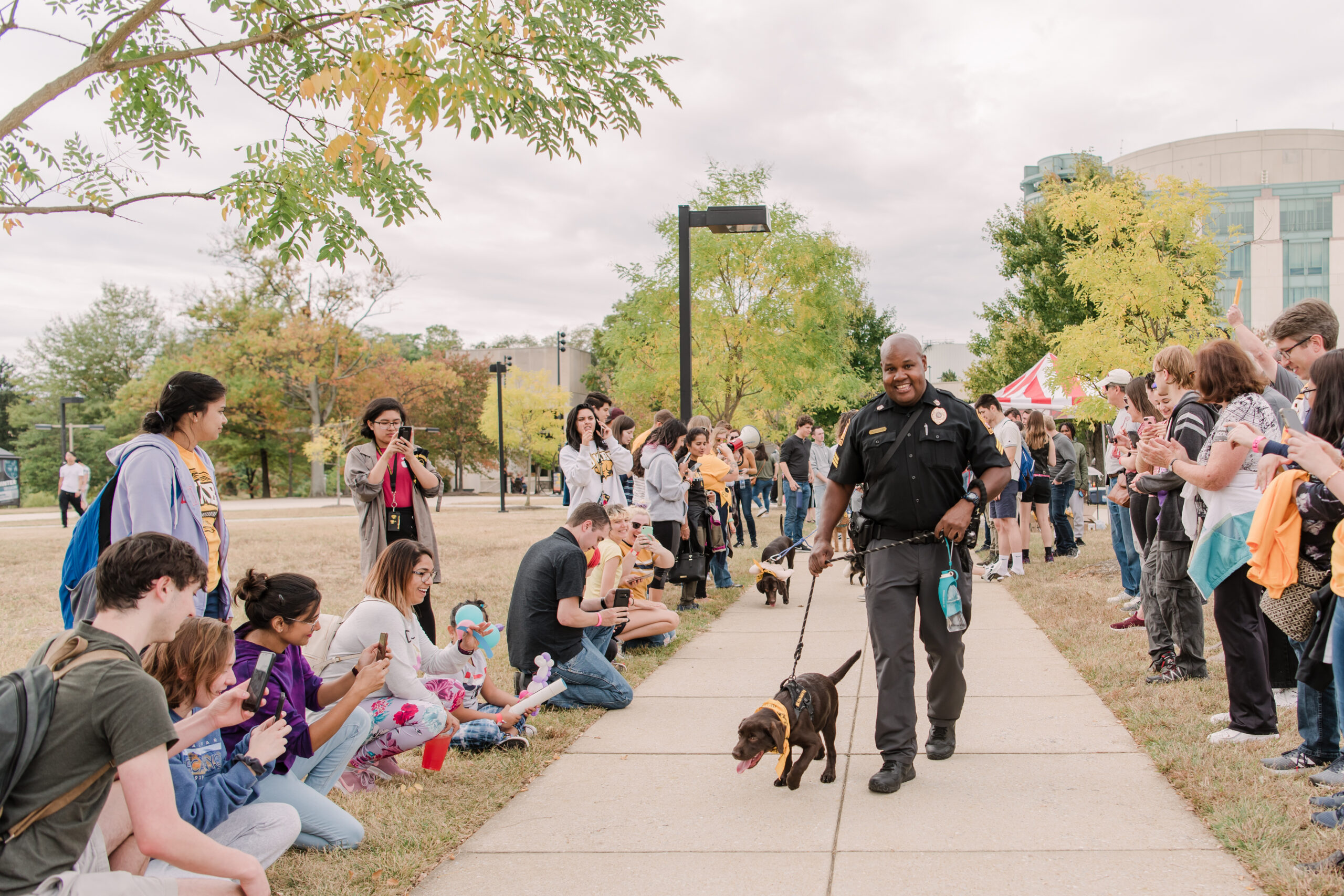 Officer Cheatum and Chip at puppy parade