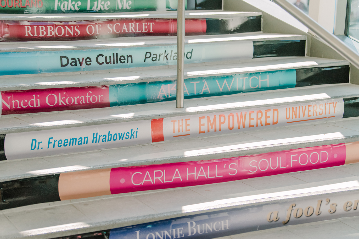 Steps with colorful renditions of book spines
