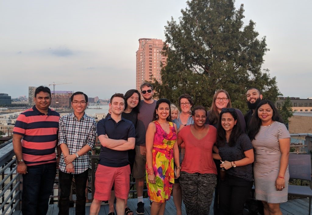 group photo on a balcony