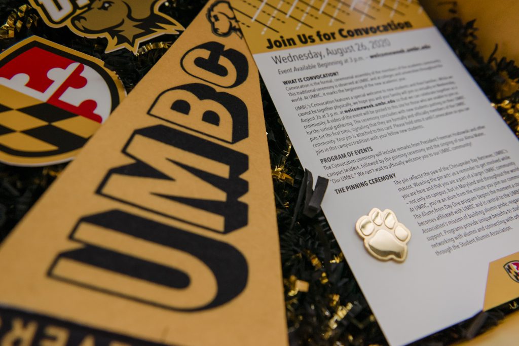 Spirit pack with UMBC pennant and paw print pin.
