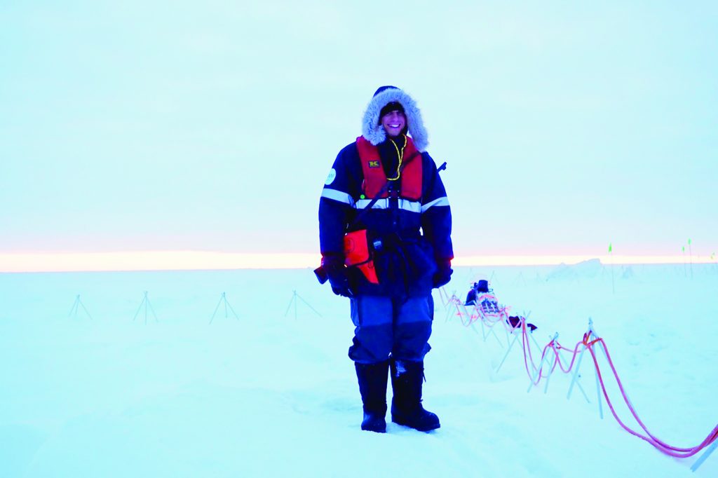 a man stands in the arctic