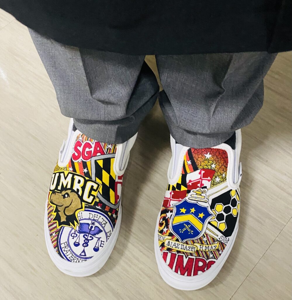 Custom shoes with UMBC logos 
