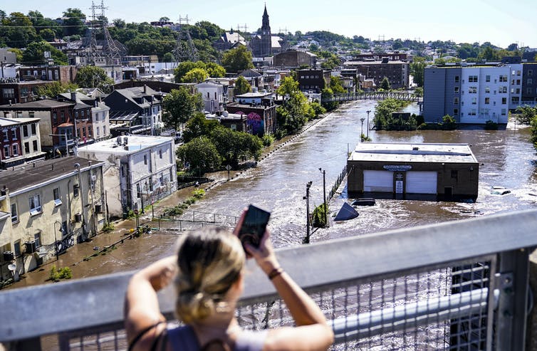 Flooding is seen in the Manayunk section of Philadelphia after the remnants of Hurricane Ida, Sept. 2, 2021. AP Photo/Matt Rourke
