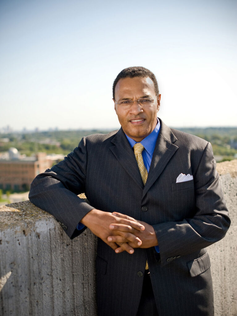 Freeman Hrabowski stands on the roof of Admin