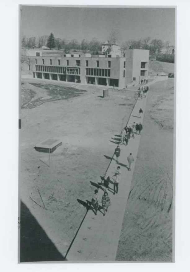 a black and white photo of a campus that is still under construction