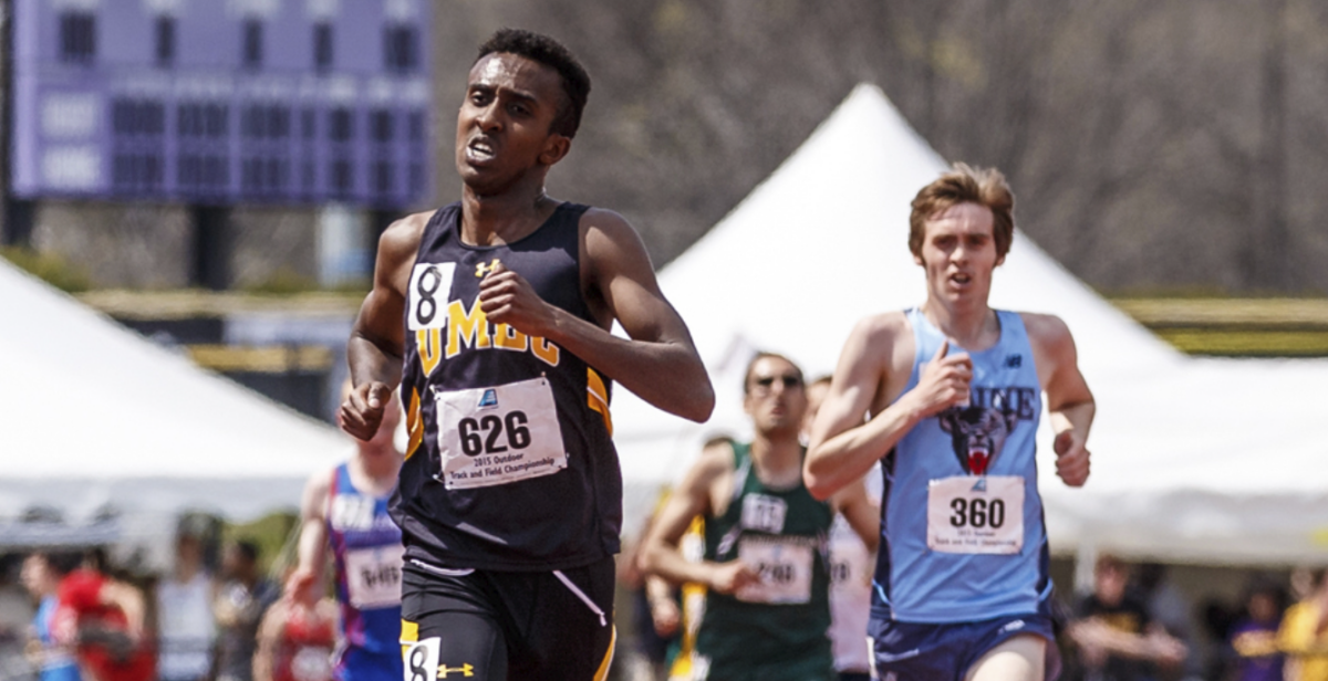 two runners at a college track meet