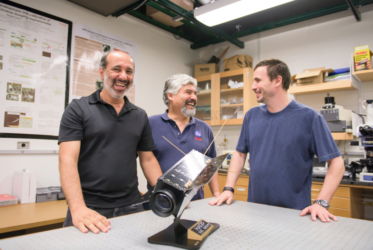 three men in a science lab
