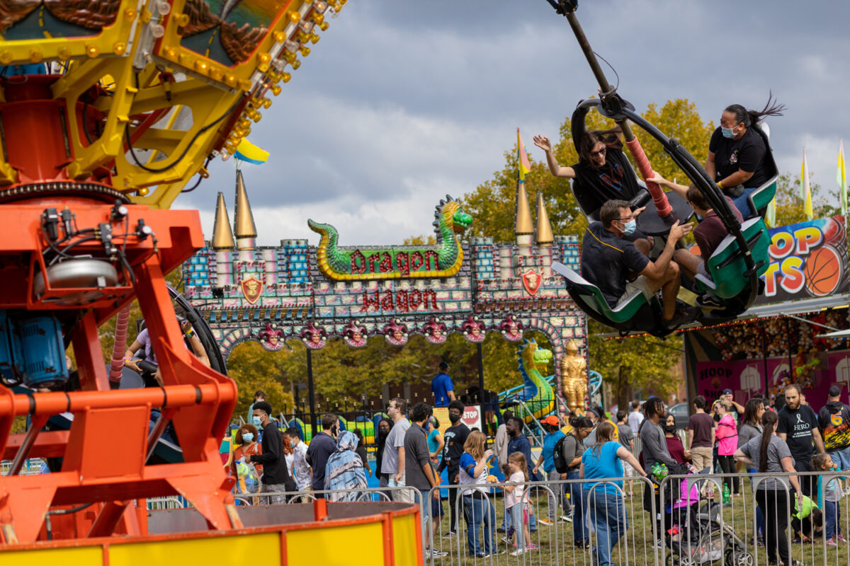 Students ride on a carnival ride
