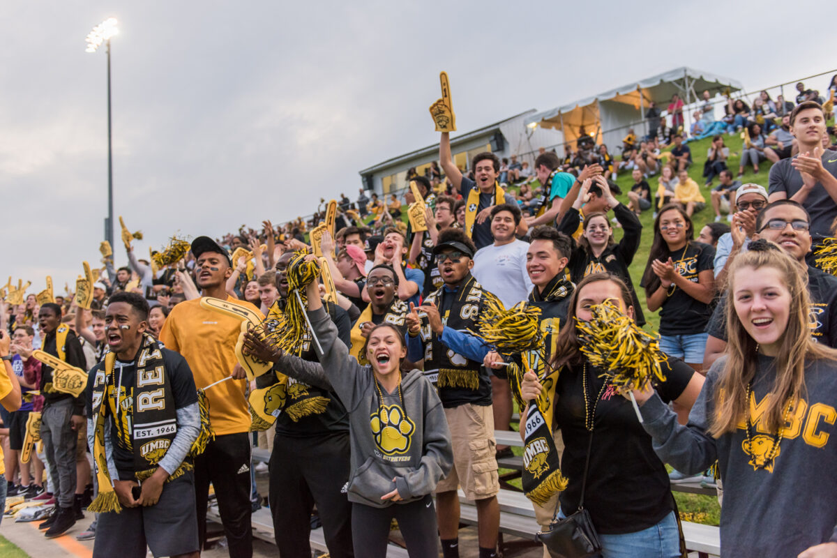 Retriever students cheer at a soccer game