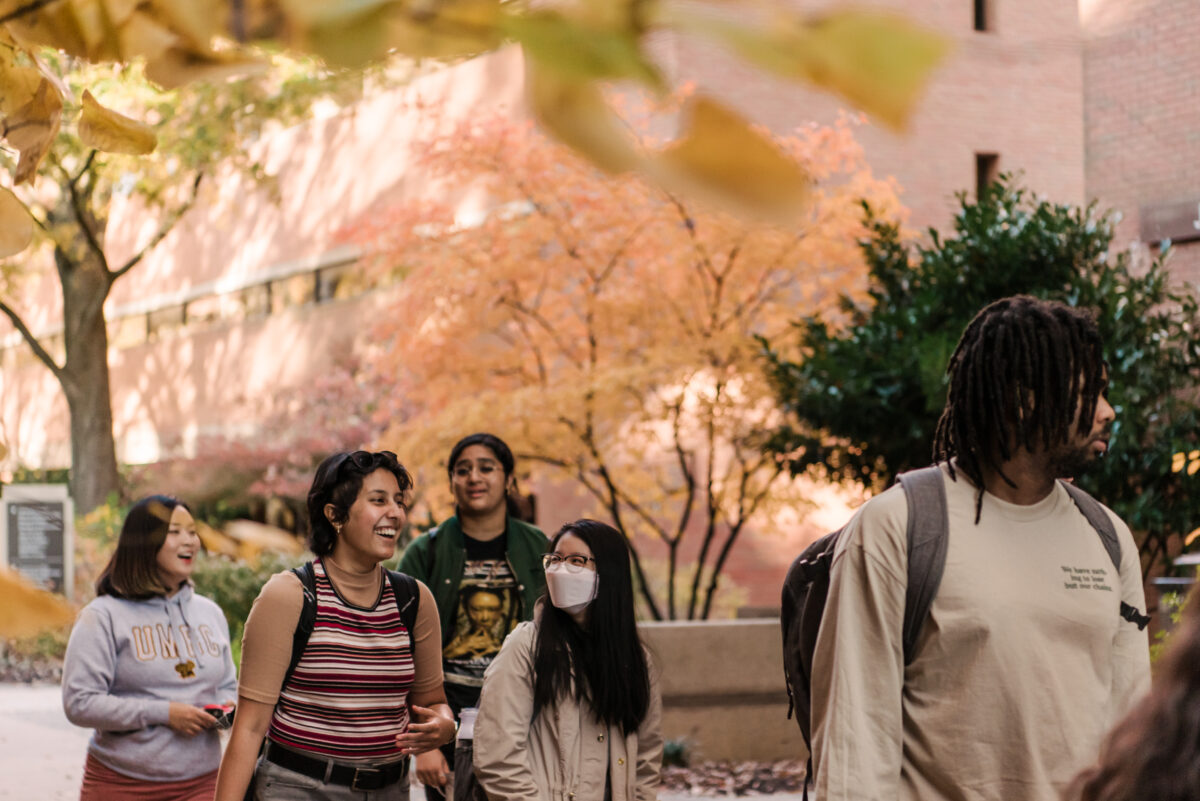 Students walking along campus.