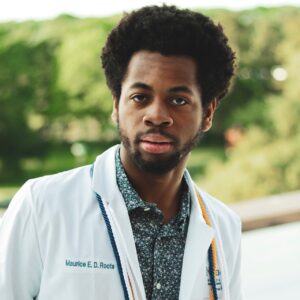 Headshot of man in lab coat