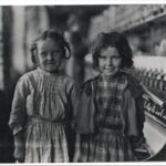 Two young girls working in a factory. Lewis Hine collection.