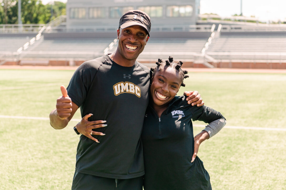 Coach Bobb and his daughter Caitlyn smile on the track. Both Bobbs have a reputation for going fast.