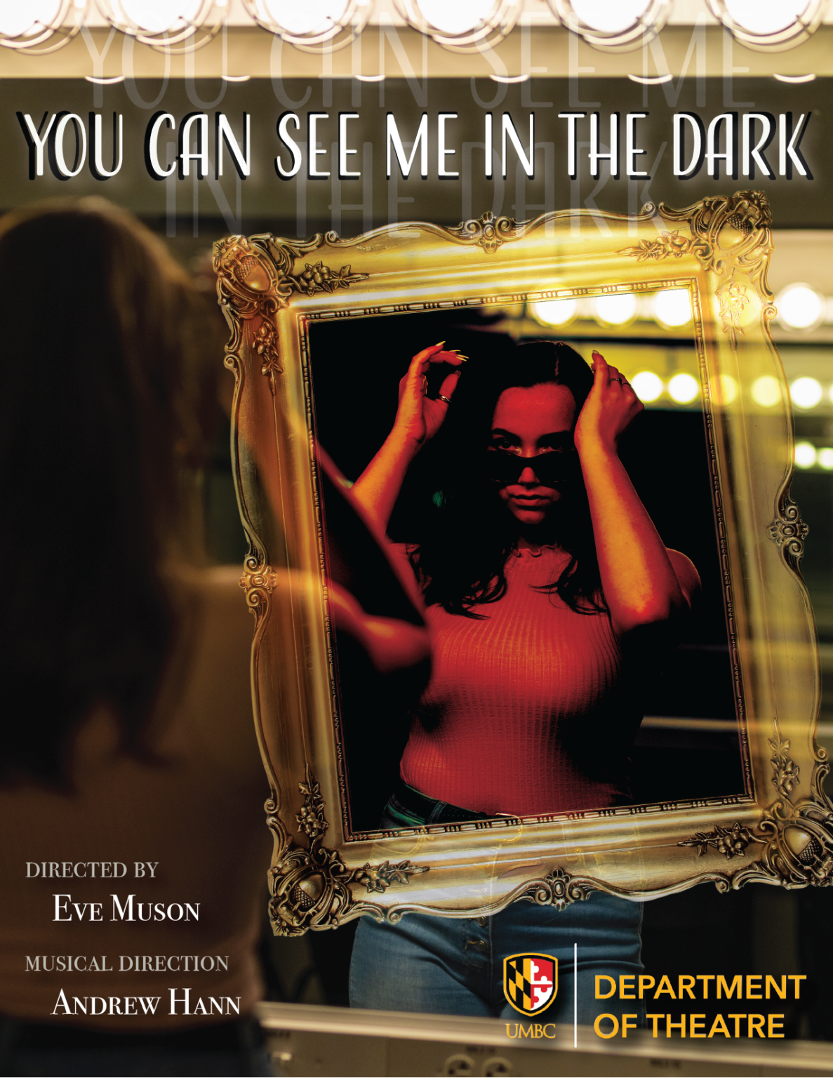 A white woman with dark glasses looks into a mirror, and we see the words "You can see me in the dark".