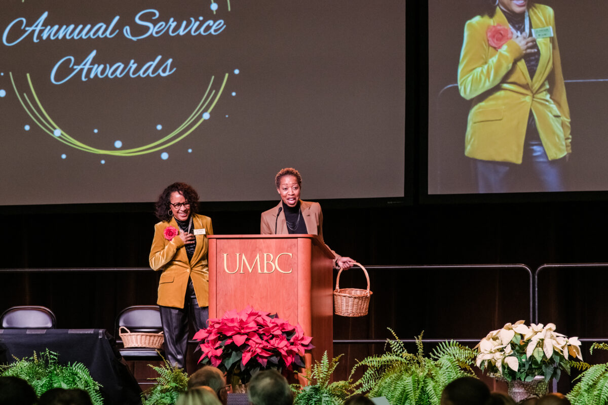 UMBC leadership recognize employees at a Staff Service Awards ceremony.