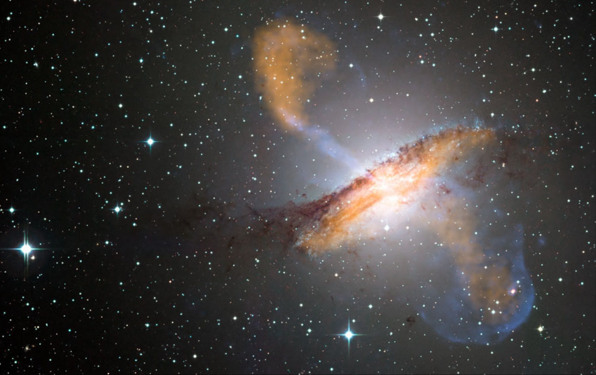 This color composite of Centaurus A, an elliptical galaxy located about 13 million light-years from Earth, reveals the lobes and jets emanating from the active galaxy’s central black hole.