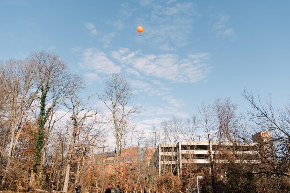 various campus shots with different balloons in the sky