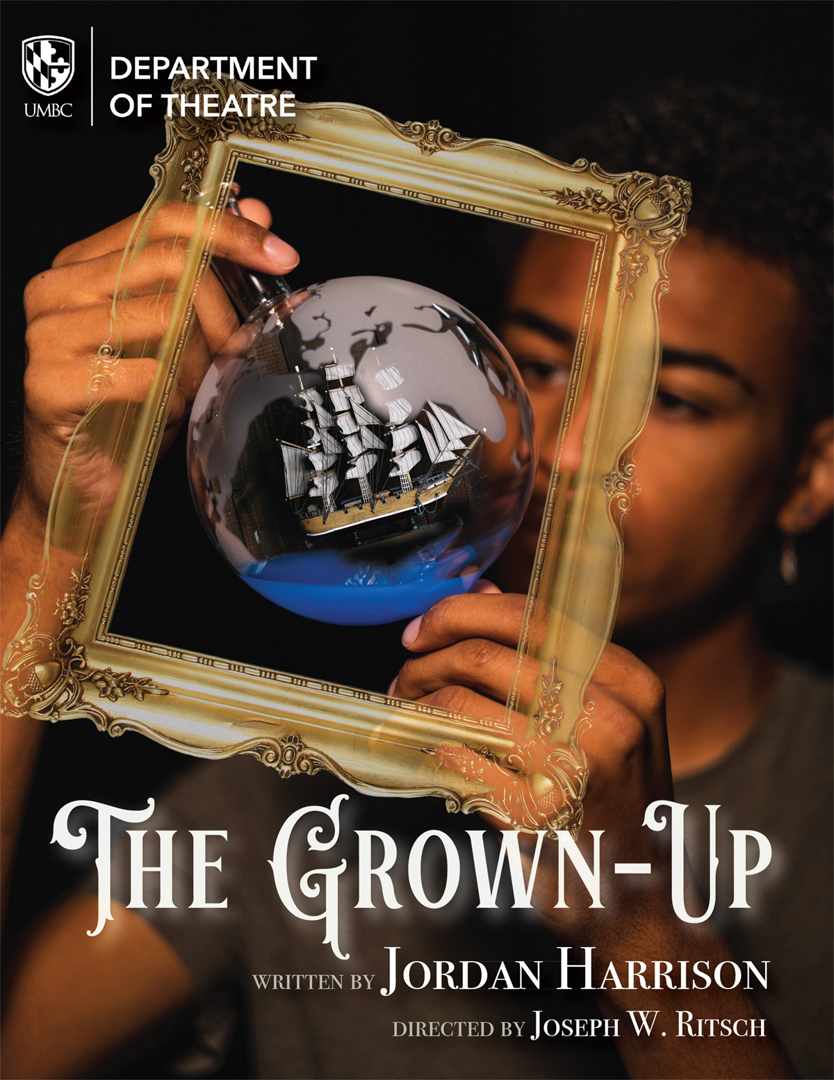 A man gazes at a ship in a bottle, with a frame around it. Words say UMBC Department of Theatre, The Grown-Up, Written by Jordan Harrison, Directed by Joseph W. Ritsch