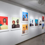Sonya Clark's Hair/Craft exhibit at the AOK Library Gallery. Images of the front and back's of Black hair styles.