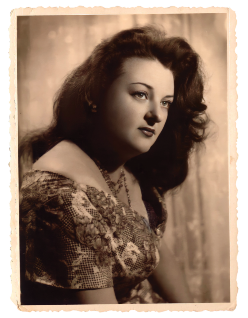 A sepia photo of a woman with thick dark hair, part of a personal narrative book by Rosenthal
