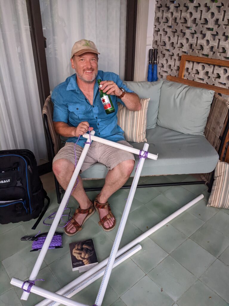 Smith displays a prototype ocean mapping technology made from PVC pipes.