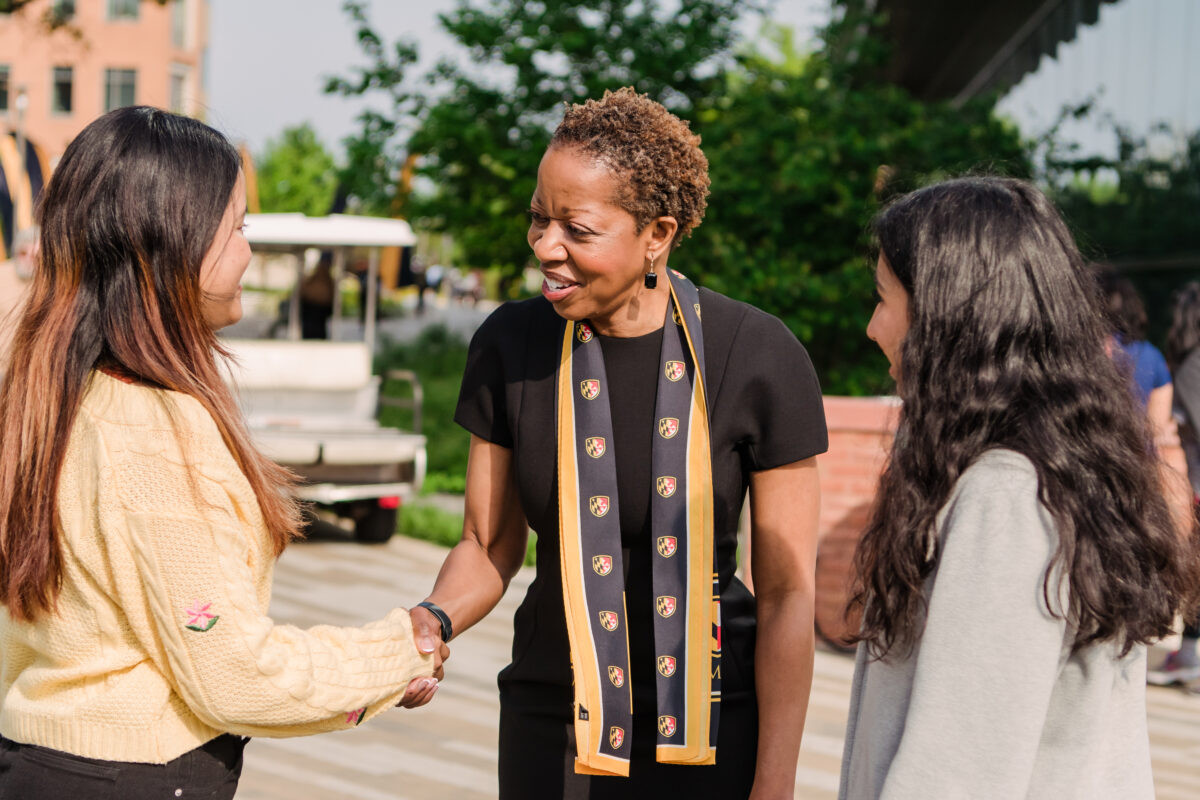 President Sheares Ashby greets students at the campus celebration after the investiture.