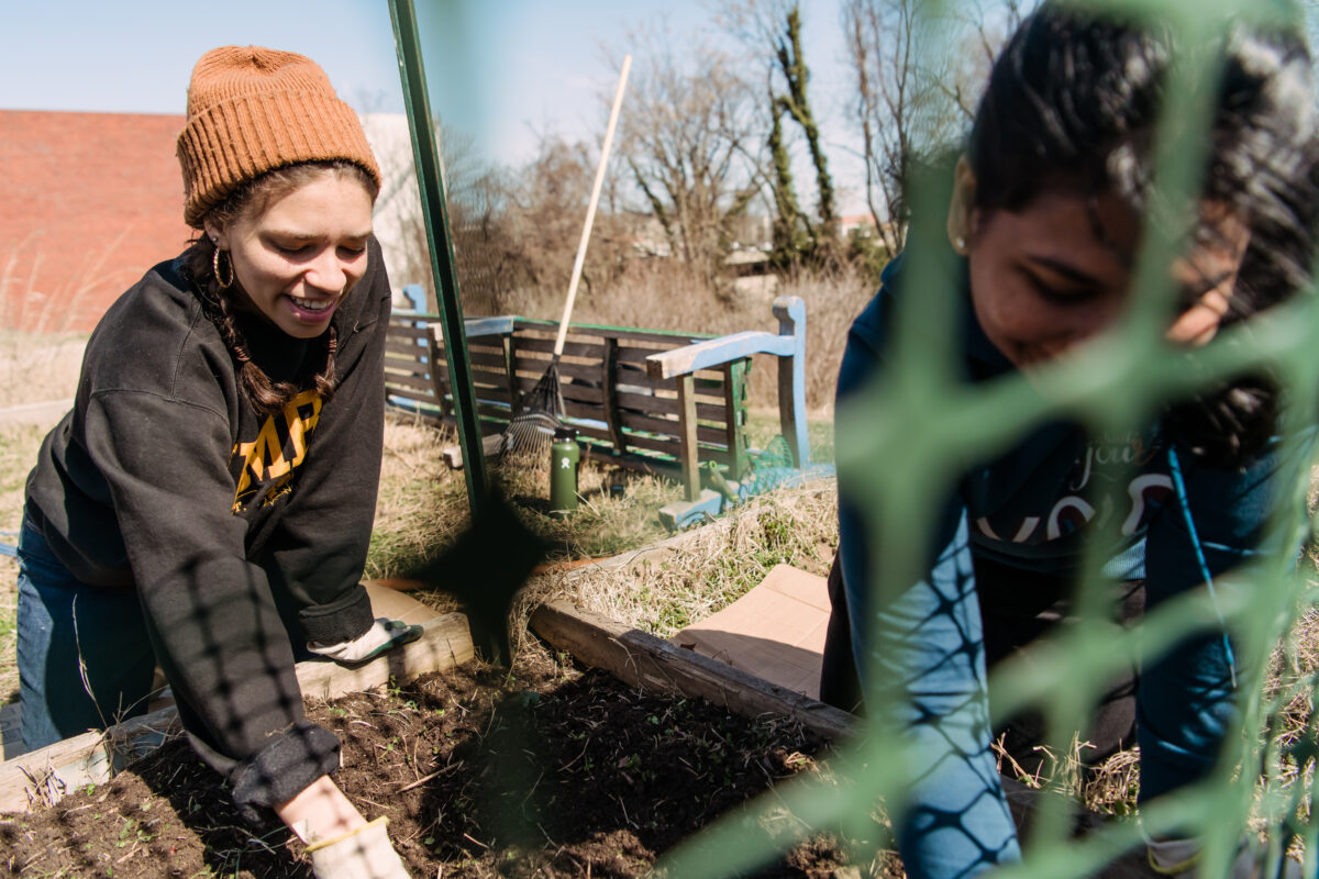 Members of Retriever Essentials get their garden plots ready for the growing season.