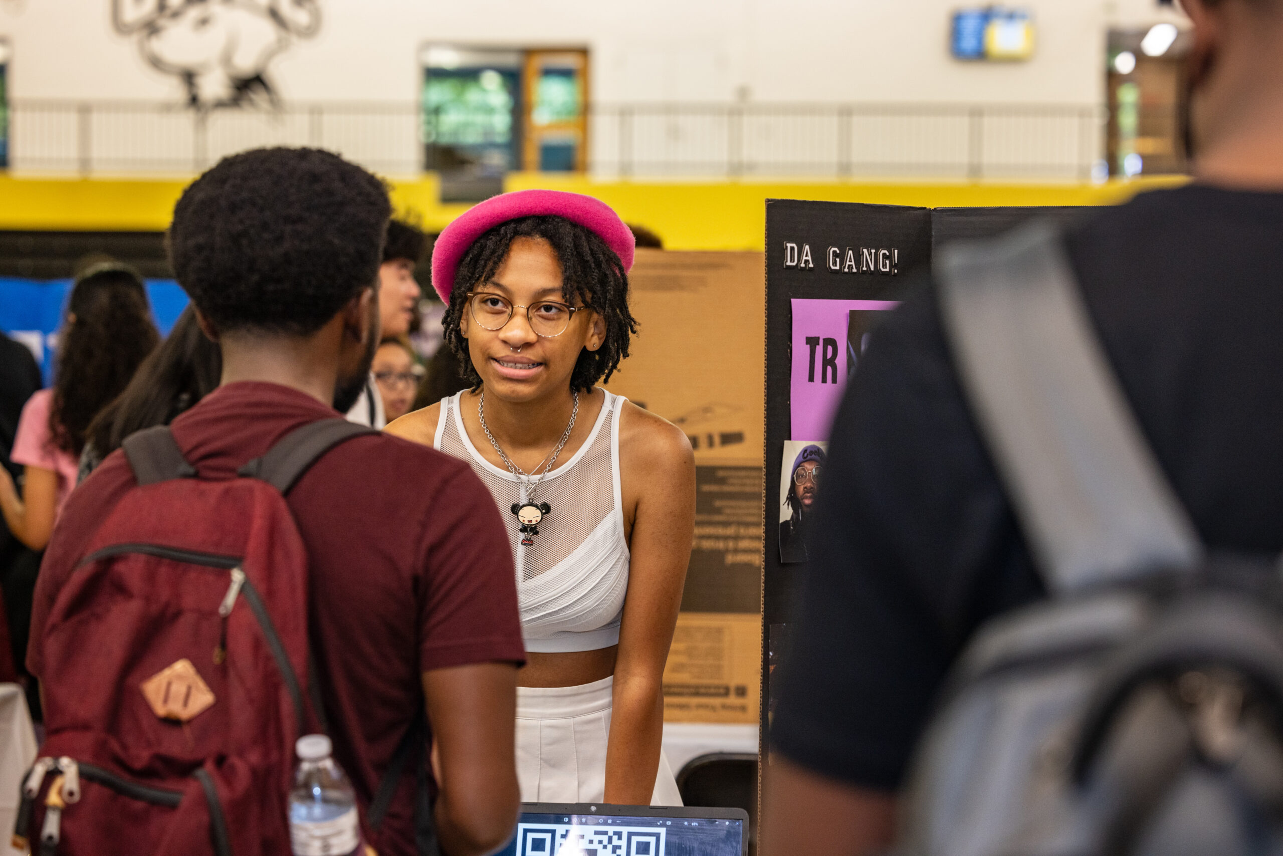 Students look at a presentation by a club at Involvement Fest.