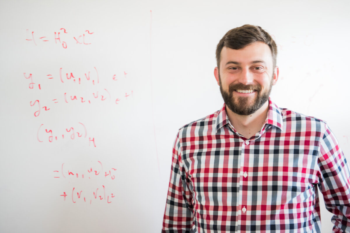 Justin Webster receives NSF grant to study mathematical models behind oscillation of plane wings, bridges, energy harvesters