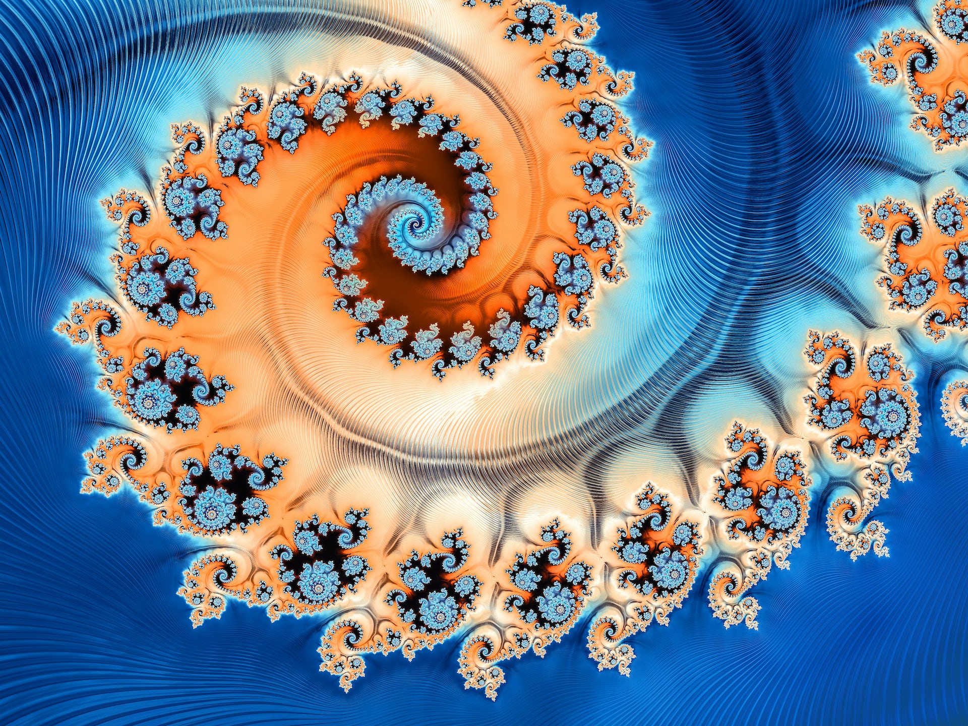 A bright blue and orange-gradient abstract spiraling fractal