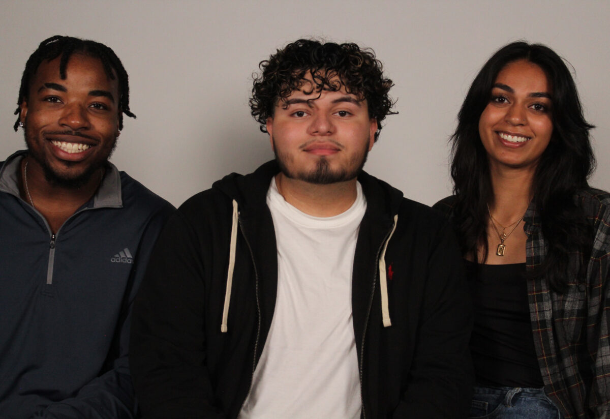 Three students posing